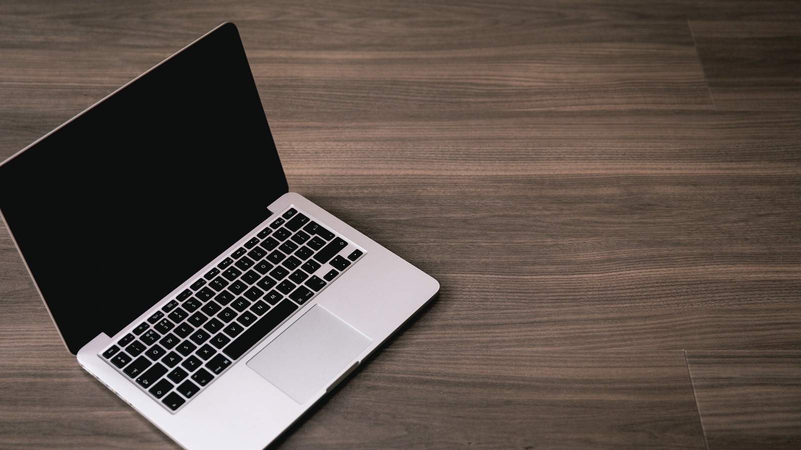 Laptop on wooden desk