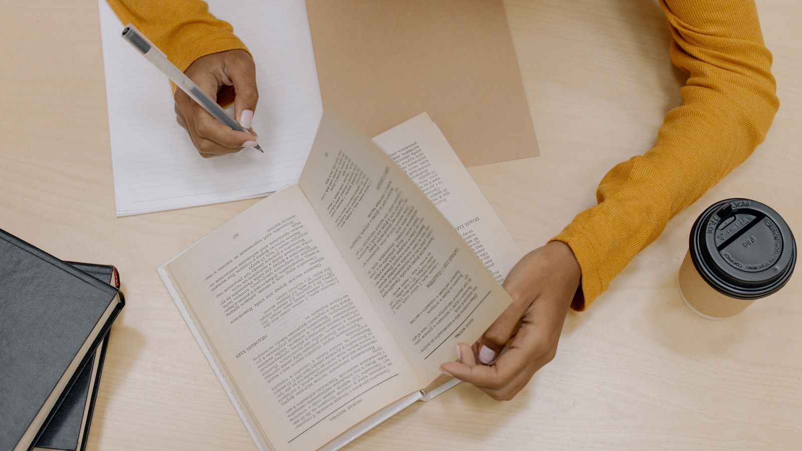 Woman studying from a book